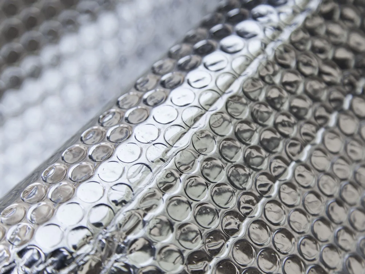 Close-up of the bubble and foil layers that make up Air Bubble Insulation material.